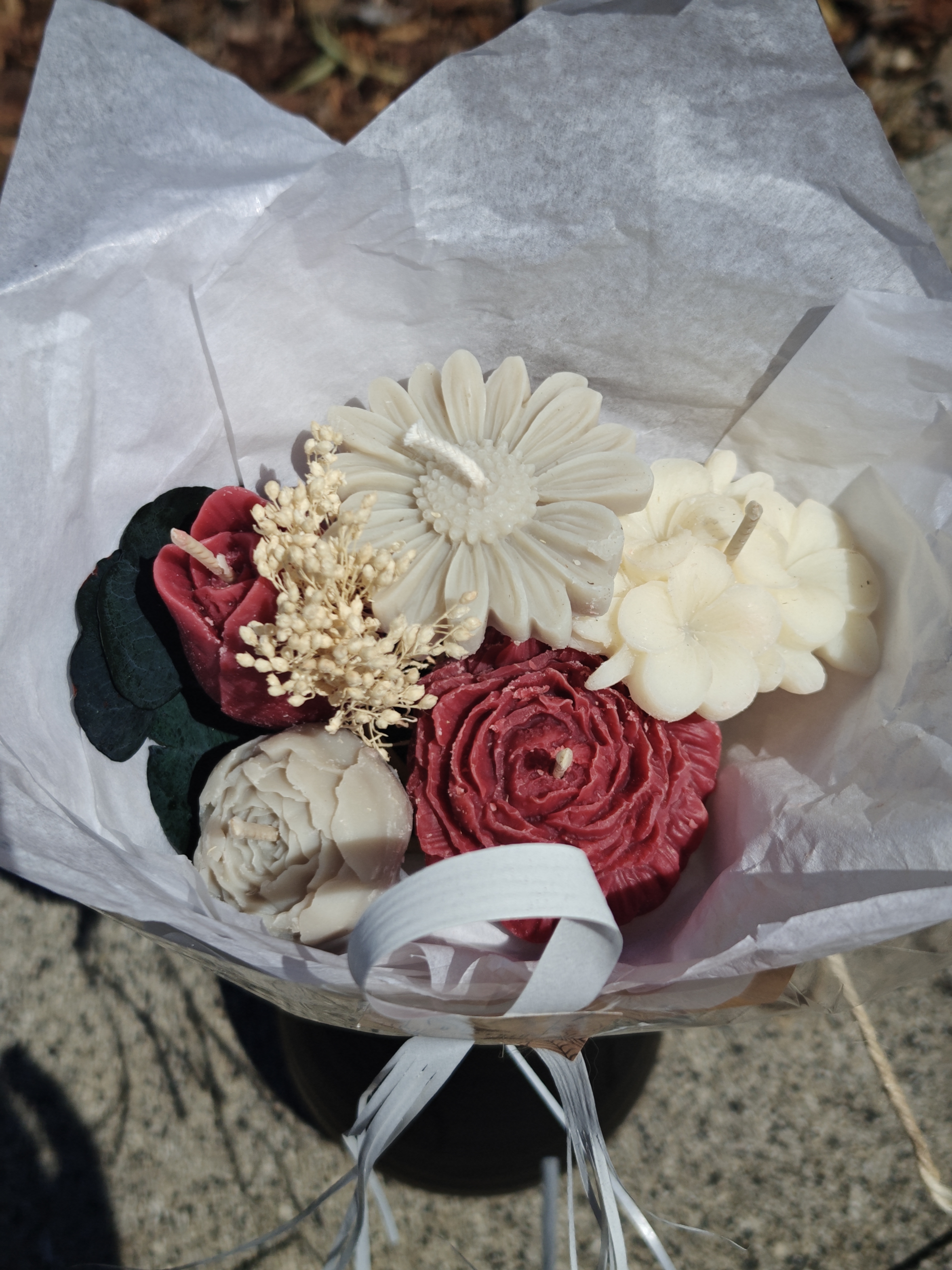 Bouquet de bougies de différentes couleurs